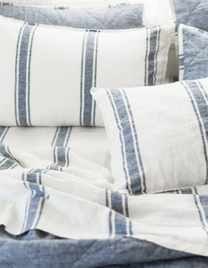 Yarn dyed woven ticking stripe linen sheet set in indigo by Salt Living